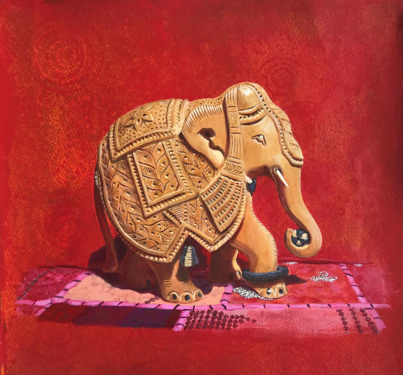a small painting of a carved elephant against a red background