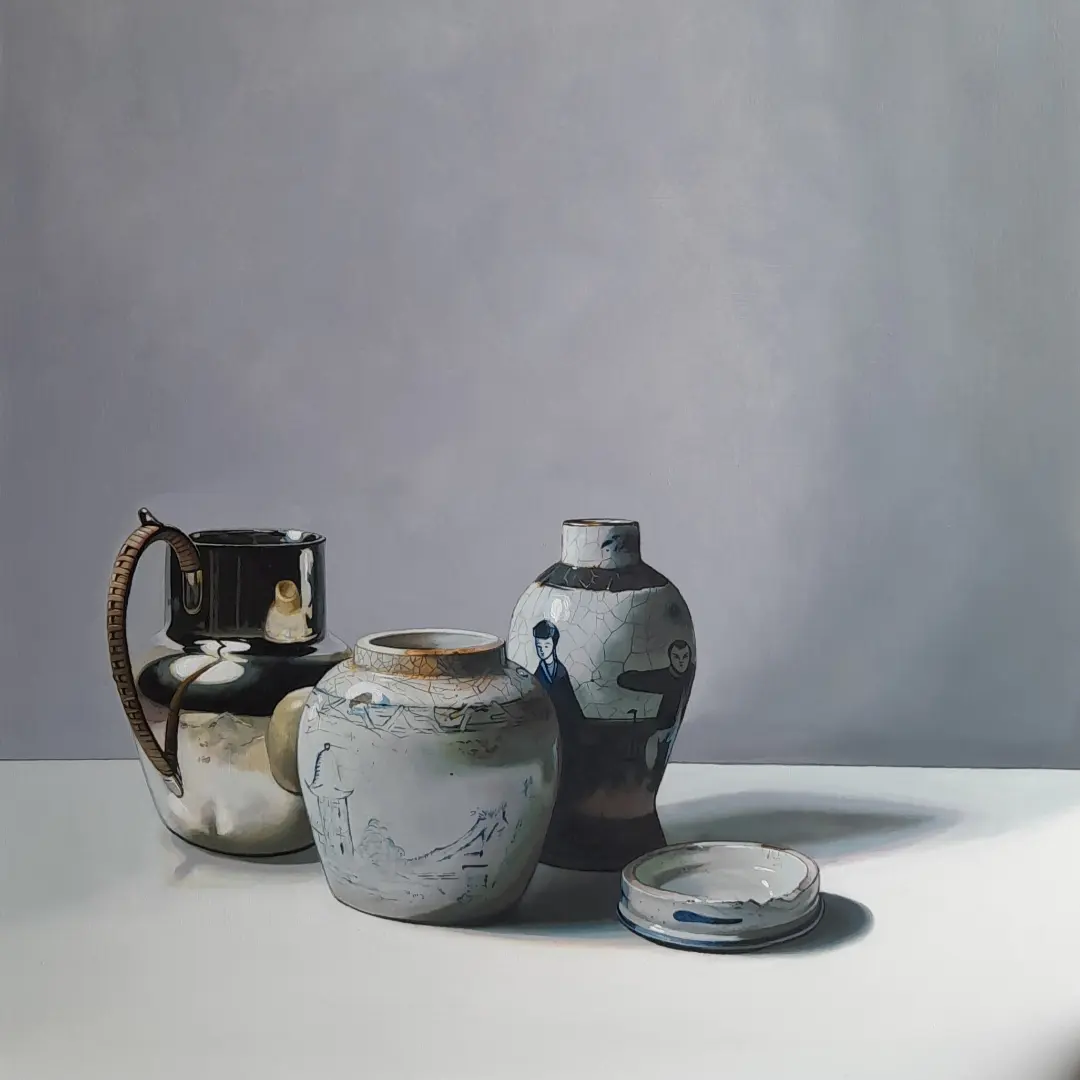 a still life painting of a silver and Chinese porcelain