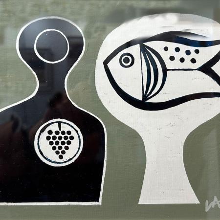 A graphic painting for black bottle and a fish