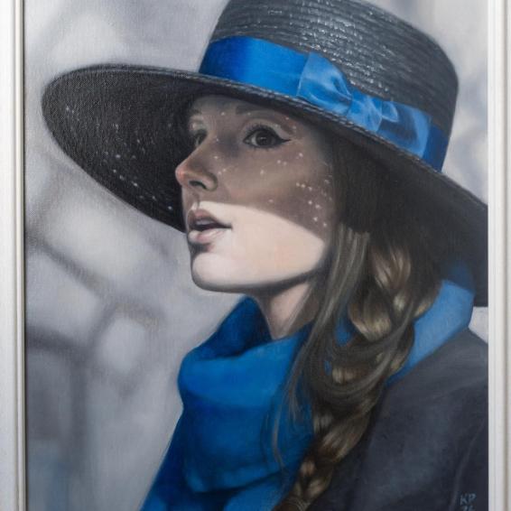 a portrait of a girl with a blue hat