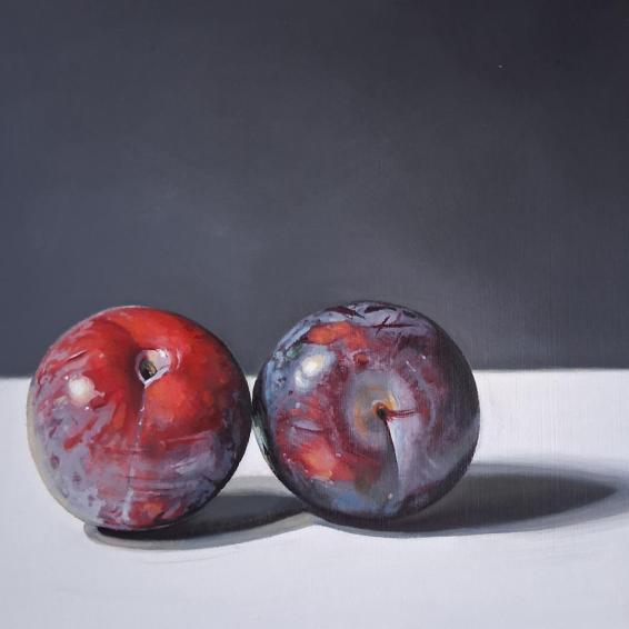 I still life painting of two plums