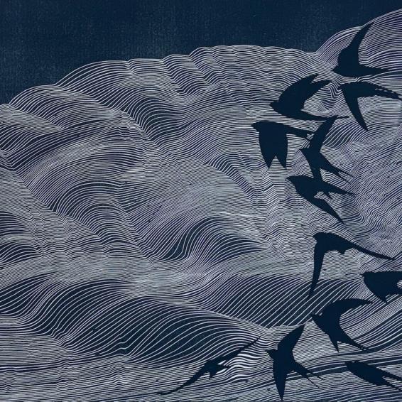 a linocut of swallows in the clouds