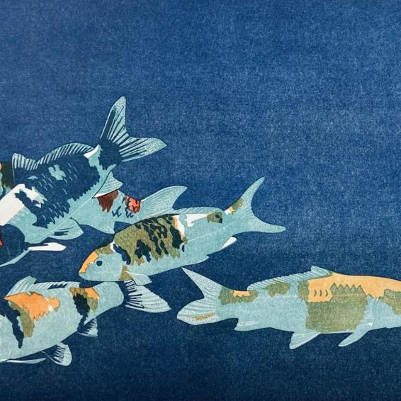a lino cut of carp underwater