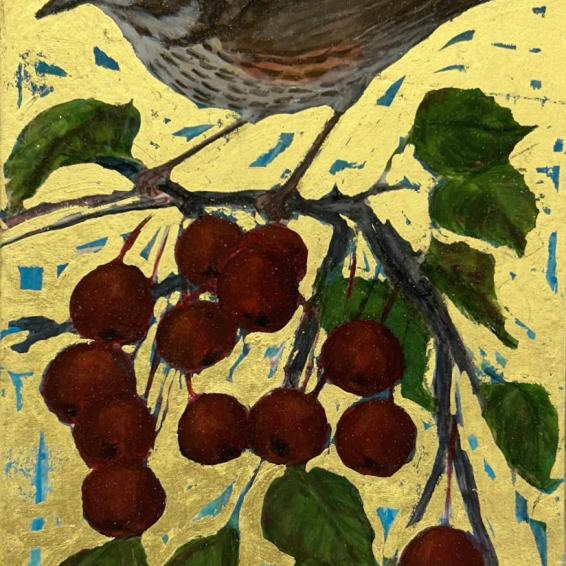 a small painting of redwing bird on gold leaf
