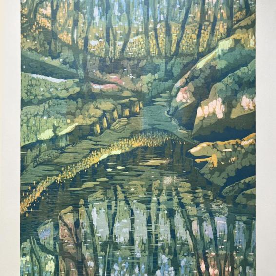 A coloured print of a pond surrounded by trees